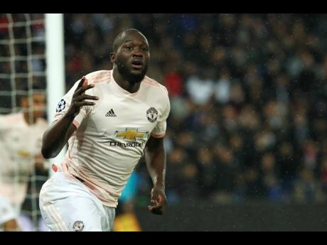 Manchester United’s Romelu Lukaku celebrates after scoring his side’s opening goal during the Champions League round of 16, second-leg match between Paris Saint Germain and Manchester United at the Parc des Princes stadium in Paris, France, yesterday.