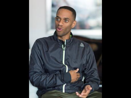 Credit: Gladstone Taylor Olympian Kemoy Campbell touches his left side where an Implantable Cardioverter-Defibrillator (ICD) was installed as a security measure to shock his heart back into rhythm in the event of any abnormalities during his recovery from collapsing in the 3000m at the recent Millrose Games.