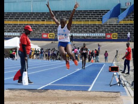 Immaculate Conception’s Onanda Lowe competing in the Girls Class Three Long Jump at the Digicel/Anthrick Corporate Area Championships held at The National Stadium on March 8, 2019.