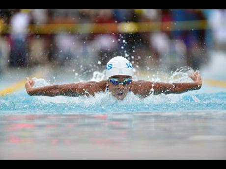 Zaneta Alvaranga of Immaculate Team A competes in the butterfly section in the girls’ age 13-14 200m medley relay. Alvaranga earlier  broke the 50m breaststroke record with a time of 35.15 at the Mayberry Swim Meet held at the National Aquatics Centre yesterday.