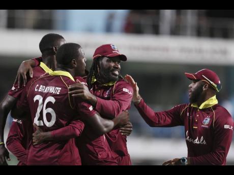 Credit: AP
Members of the Windies One-Day International cricket team celebrate after beating England by 26 runs in the second One-Day International cricket match at the Kensington Oval in Bridgetown, Barbados, on Friday, February 22, 2019.