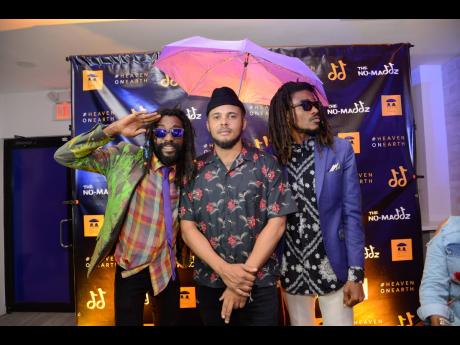 Major Lazer’s Walshy Fire and The No-Maddz at the group’s pre-listening album soiree at Epican in Kingston on Wednesday.