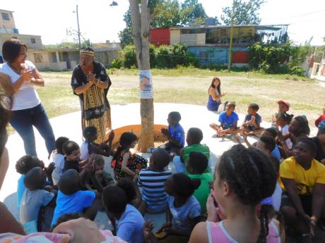 Credit: Contributed School children at the inauguration of the Tree of Words.