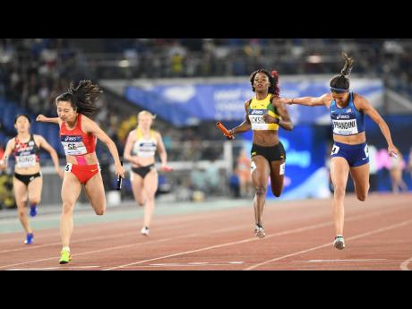 Shericka Jackson (second right) anchors Jamaica to third, in a time of 1:33.21 minutes, in the Women’s 4x200m relay final at the IAAF World Relay Games in Yokohama, Japan, yesterday. France and China took gold and silver respectively. Ricardo Makyn/Chief Photo Editor