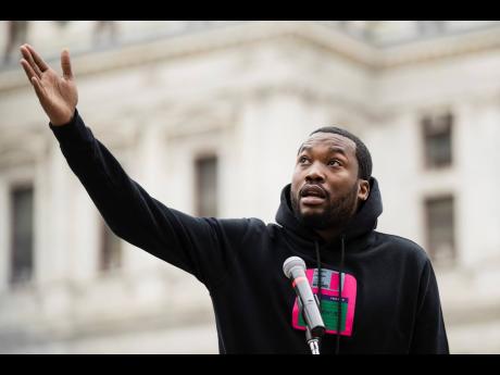 Credit: AP Meek Mill speaks at a gathering to push for drastic changes to Pennsylvania’s probation system in Philadelphia. Mill has become a symbol for reform after a judge in Pennsylvania sentenced him to two to four years in prison for minor violations of his probation in a decade-old gun and drug-possession case.