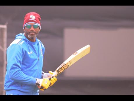 Windies head coach Floyd Reifer engaging in batting practice with his team in a training session at Trent Bridge, Nottingham, England, yesterday ahead of Thursday’s ICC World Cup match with Australia. 