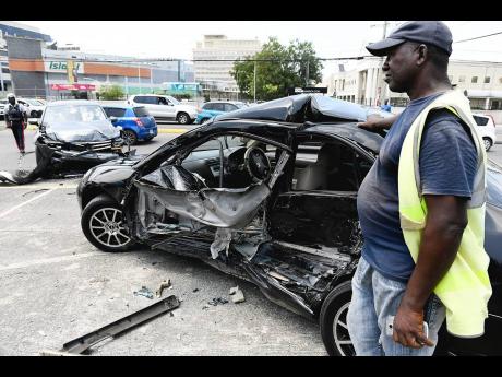 In this April 2018 file photo, a Volkswagen SUV and a Honda motor car collided on Trafalgar Road in Kingston.