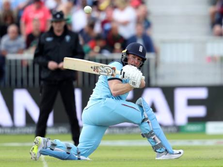 Credit: AP England’s captain Eoin Morgan during the ICC World Cup match against Afghanistan at Old Trafford in Manchester, England, yesterday.