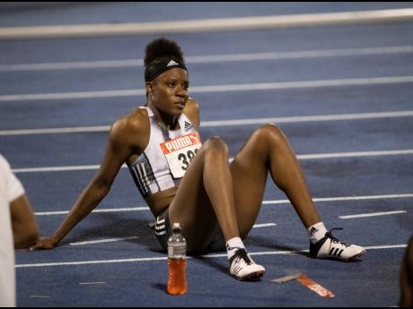 Danielle Williams reacts after being called for a false start in the 100m hurdles final at the SVL/JAAA National Senior Championships at the National Stadium on June 23. 