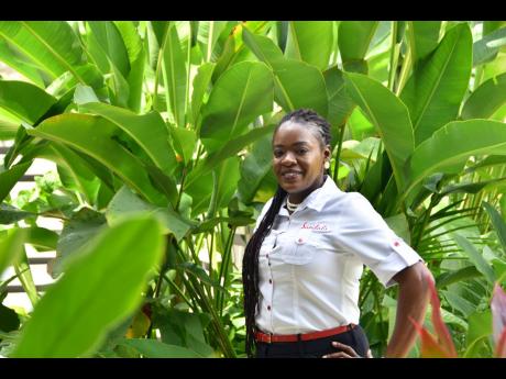 Credit: Contributed A boss smile! Spa Manager at Sandals Negril, Denise Morrison is all smiles as she posed for a quick picture outside the Red Lane Spa on resort.