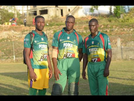 Cousins (from left) Anthony Walters, Jermaine Chisholm and captain Sheldon Pryce of Gayle Cricket Club in St Mary pose after helping their team to the play-offs of the SDC/Wray and Nephew National Community T20 Competition last weekend.