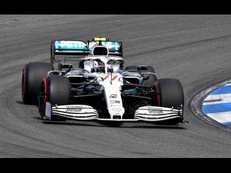 Credit: AP In this file photo dated Saturday, July 27, Mercedes driver Valtteri Bottas of Finland steers his car during the qualifying Formula One session at the Hockenheimring racetrack in Hockenheim, Germany.