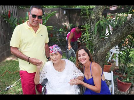 Credit: Cntributed Eva May Wright is flanked by grandson-in-law Daryl Vaz and granddaughter Ann-Marie Vaz.
