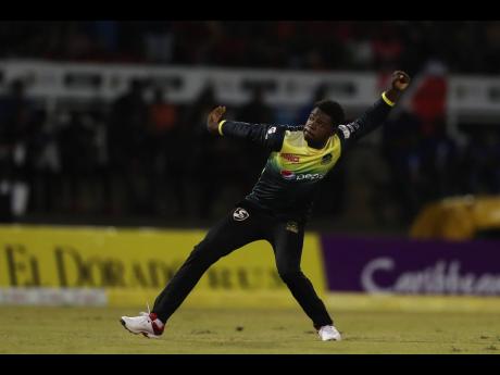 Credit: Ashley Allen - CPL T20 Christopher Lamont of Jamaica Tallawahs celebrates the wicket of Lendl Simmons of Trinbago Knight Riders during the Hero Caribbean Premier League match between the two teams at Queen’s Park Oval on September 6, in Port-of-Spain, Trinidad and Tobago.