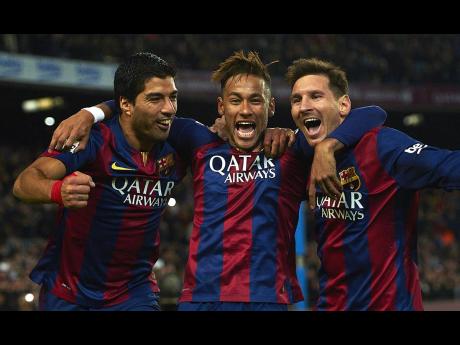 Credit: AP In this 2015 photo, Neymar (centre), then of Barcelona, celebrates a goal scored against Atlético Madrid with teammates Lionel Messi (right) and Luis Suarez during a La Liga match at Camp Nou in Barcelona, Spain.