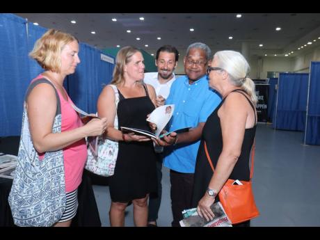 
Nordic Tour Operators taking in all the information they could get on Jamaica from Jamaica Tourist Board UK sales manager Torrance Lewis (second right).