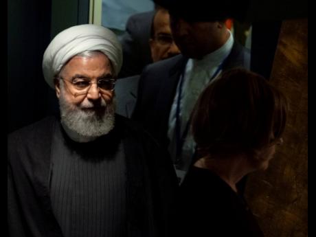 Iran’s President Hassan Rouhani walks towards the podium before addressing the 74th session of the United Nations General Assembly yesterday. 
