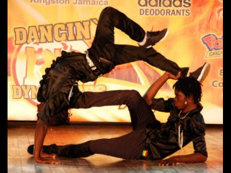 Credit: File In this March 2011 file photo, two local break dancers display their skills in competition during an episode of Television Jamaica’s Dancing Dynamites.