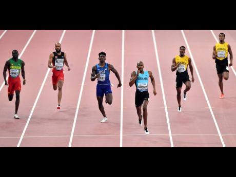 Steven Gardiner of The Bahamas (third right) strides to victory in the 400m at the IAAF World Championships in Doha, Qatar, on Friday, October 4, 2019. Others (from left) are Kirani James of Grenada, Machel Cedenio of Trinidad and Tobago, Fred Kerley of the United States, ​Demish Gaye of Jamaica, and Akeem Bloomfield, also of Jamaica. Gaye was fourth and his compatriot, Bloomfield, finished eighth.