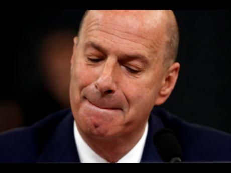 US Ambassador to the European Union Gordon Sondland pauses as he gives his opening statement as he testifies before the House Intelligence Committee on Capitol Hill in Washington yesterday. (AP)