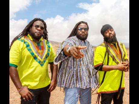 Mr. Mojo, Gramps and Peetah Morgan representing for Africa and Jamaica