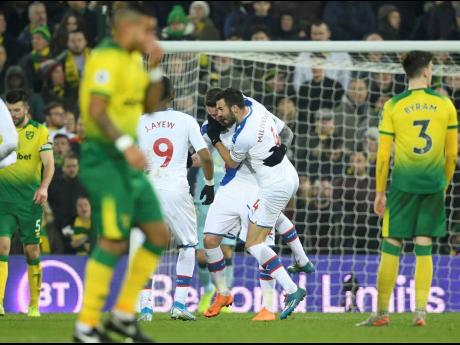 Crystal Palace’s Connor Wickham  (centre left)  celebrates scoring his side’s first goal of the game against Norwich City.  