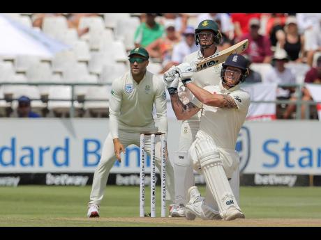 England’s batsman Ben Stokes smashes the ball for six during day four of the second cricket Test between South Africa and England at the Newlands Cricket Stadium in Cape Town, South Africa, yesterday.