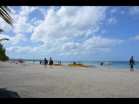 A section of Negril's famous seven-mile beach. Harassment and drug hustling continue to be concerns for tourist industry stakeholders.