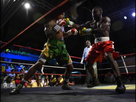 Credit: File Jamaica’s Nico Yeyo faces off against Canada’s Mayron Zefferino during a Wray & Nephew Contender Series match at the Chinese Benevolent Association Auditorium on Wednesday, April 11, 2018.