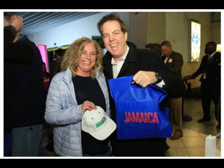 Credit: Contributed Hockey fans were happy to receive Jamaica-themed products.