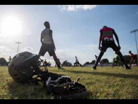 Lacrosse team members practice during a training session in Kingston. Strategic planning exercises by companies should be approached like a team sport, but beware the pitfalls.