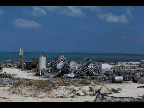 A concrete factory lays shattered, destroyed by Hurricane Dorian in Marsh Harbor, Abaco Island, Bahamas, on September 7, 2019. Hurricanes and other natural disasters are some of the risks that people deal with regularly, and which require adaptation and mitigation planning.