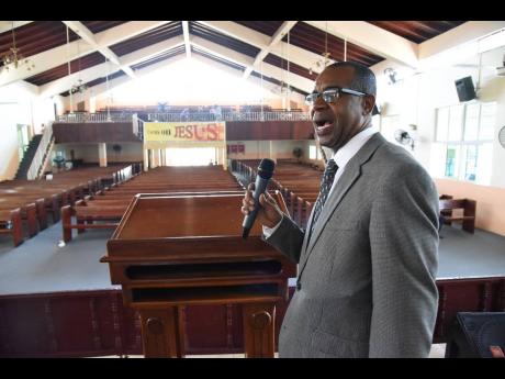 Leroy Laing, pastor of the Pentab Tabernacle in Kingston, preaching to an almost empty church on Good Friday, as only 10 members turned up in keeping with government stipulations to prevent the spread of COVID-19.  Pastor Laing says they streamed the sermon live to members who stayed at home.