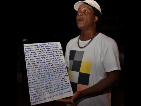 Mark Brooks, a self-proclaimed ‘hustler’ from St Elizabeth, displays a letter addressed to the prime minister about concerns over social and economic effects of a lockdown of the State.