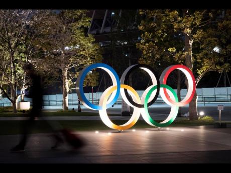 The Olympic rings are seen in Tokyo, Japan, on Monday, March 30. 
