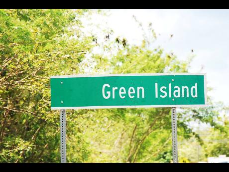 Credit: File The Green Island sign stands along the North Coast Highway in Hanover.