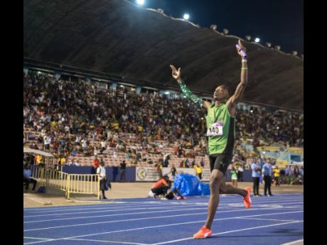 
Kimar Farquharson of Calabar High celebrates as he crosses the finish line in the 4x800m open for high-school boys at the Gibson McCook Relays on February 29, 2020.  