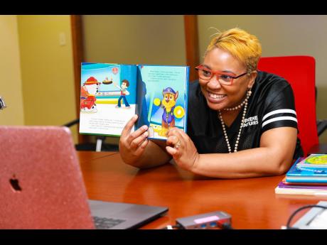 Supreme Ventures’ Gail Abrahams is all smiles as she shares her storybook with the thousands of viewers who tuned into the Supreme Ventures Foundation’s (SVF) Instagram Live for Read Across Jamaica Day. The SVF took their story reading outreach to their social media platforms in light of school closures and movement restrictions implemented to stem the spread of COVID-19 coronavirus.