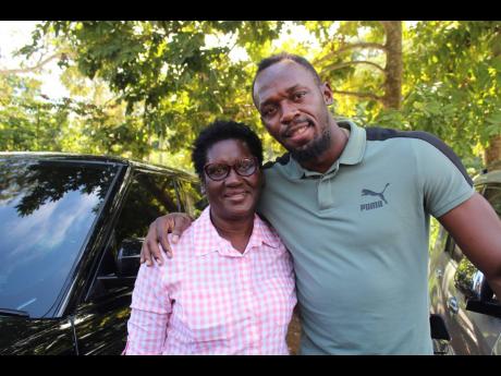 Jennifer Bolt and her son, Usain, share a smile. 