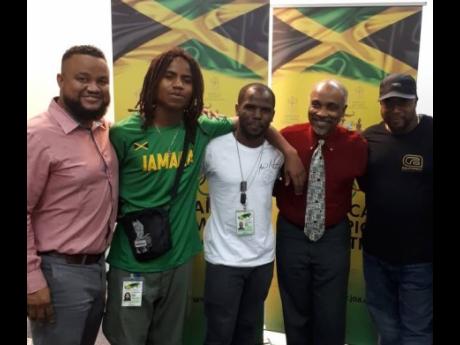 From left: Ryan Foster, president of Skateboarding Jamaica Limited (SJL); Tafari Whitter, national skateboarder; Mario Notice, national skateboarder; Christopher Samuda, Jamaica Olympic Association (JOA) president; and Steve Douglas, vice-president, SJL, pose during a courtesy call at the JOA headquarters.  