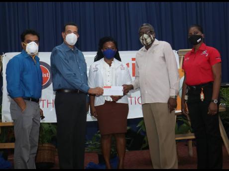 Credit: From left: Dr Guna Muppuri, founder of Bioprist and Indies Pharmaceuticals; Mayor Homer Davis; Ebany Montique-Gayle, chief pharmacist; Bishop Conrad Pitkin, custos of St James, and Thelma Harwood.