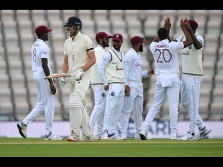 Credit: AP England’s Dom Sibley (second left) leaves the field after being dismissed by West Indies’ Shannon Gabriel (second right) during the first day of the first cricket Test match between England and West Indies, at the Ageas Bowl in Southampton, England, ye