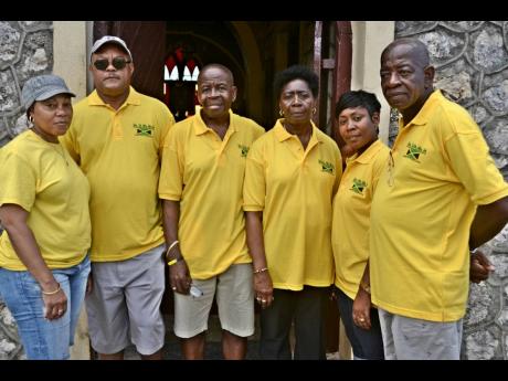 In this 2017 photograph, members of Beecher Town Give Back Association smile for the camera during a health fair in Beecher Town, St Ann. From left are: Fay Grocia, president; Audley Codner; Sidney Brown, treasurer; Blanche Rattigan-Cummings; Mornice Mille