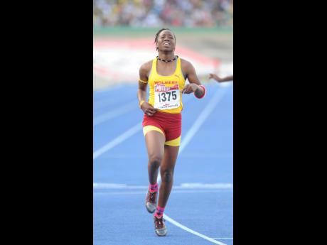 Shauna Helps competing at the 2012 ISSA/GraceKennedy Boys and Girls’ Athletics Championships at the National Stadium.