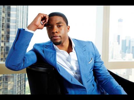 This July 21, 2014 file photo shows actor Chadwick Boseman posing for a portrait in New York.  Boseman, who played Black icons Jackie Robinson and James Brown before finding fame as the regal Black Panther in the Marvel cinematic universe, has died of canc