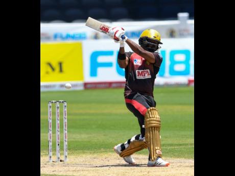 Darren Bravo of Trinbago Knight Riders hits a 4 during the Hero Caribbean Premier League match between Trinbago Knight Riders and St Lucia Zouks at Brian Lara Cricket Academy yesterday in Tarouba, Trinidad and Tobago.