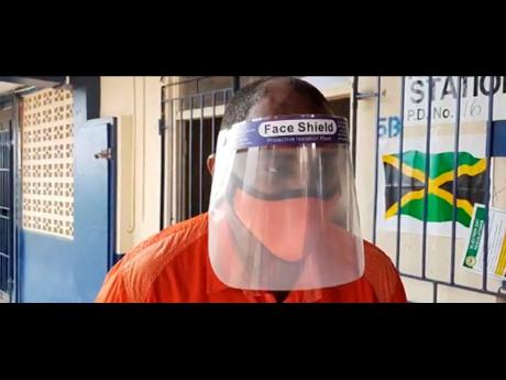 Julian Robinson being interviewed at Jamaica College.