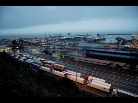 In this photo dated February 1, 2020, lorries wait to board ferries on the morning after Brexit took place at the Port of Dover in Dover, England.
