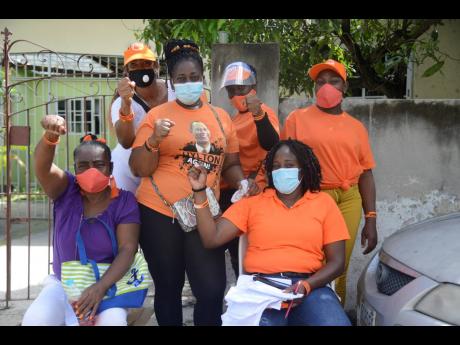 
PNP supporters and election day workers outside St Cyprian’s Church in August Town on September 3, 2020. 