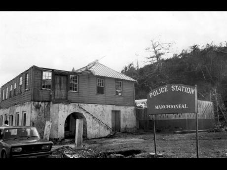 The Manchioneal Police Station in Portland, which housed a courthouse downstairs, was battered by Hurricane Gilbert. Only one room to the back, upstairs, was spared.